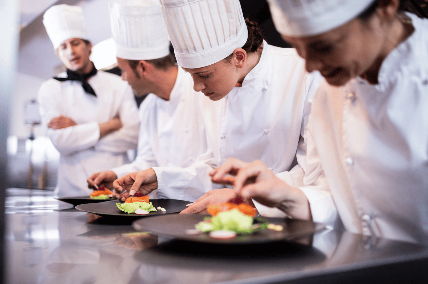 Singapore Michelin-starred chefs plating vibrant gourmet dishes in a high-pressure kitchen, showcasing teamwork, precision, and culinary excellence.