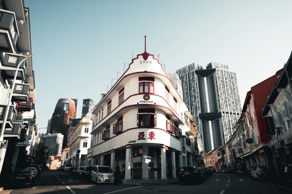 Tanjong Pagar: The Ultimate Food Centre, featuring a distinctive building with a red and white roof in Singapore’s dining area.