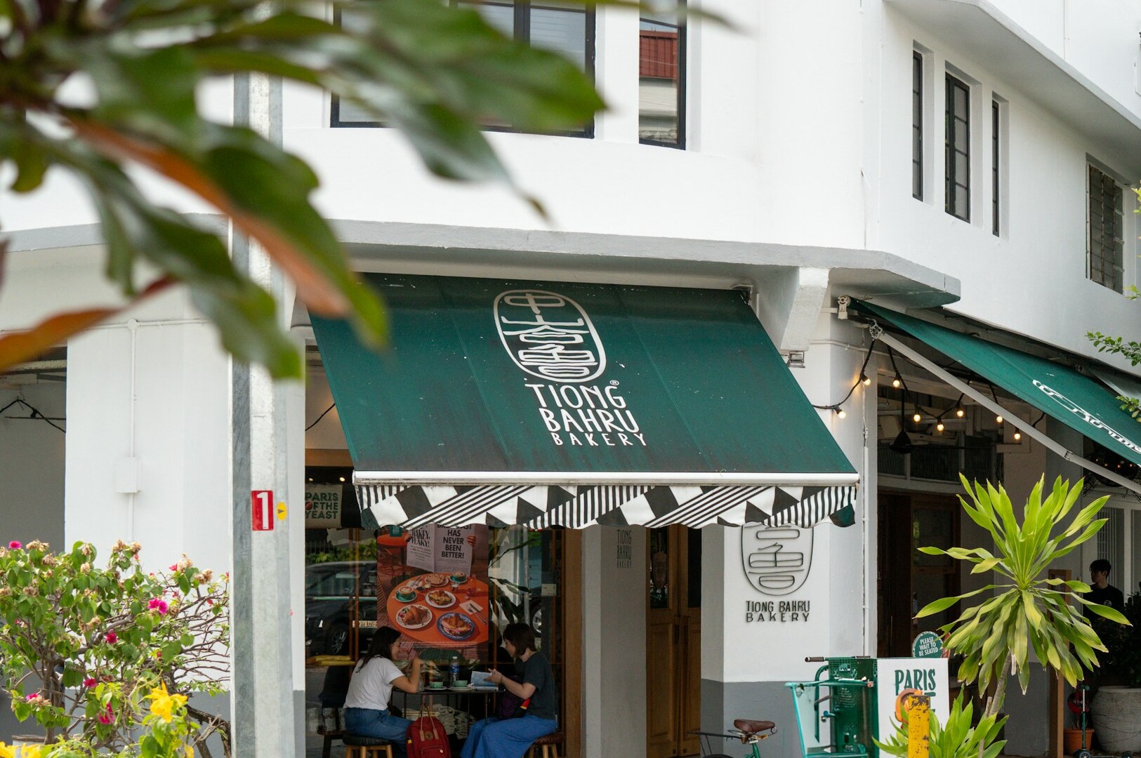 Artisanal Tiong Bahru Bakery and Coffee Culture at Singapore, showcasing a cozy cafe atmosphere.