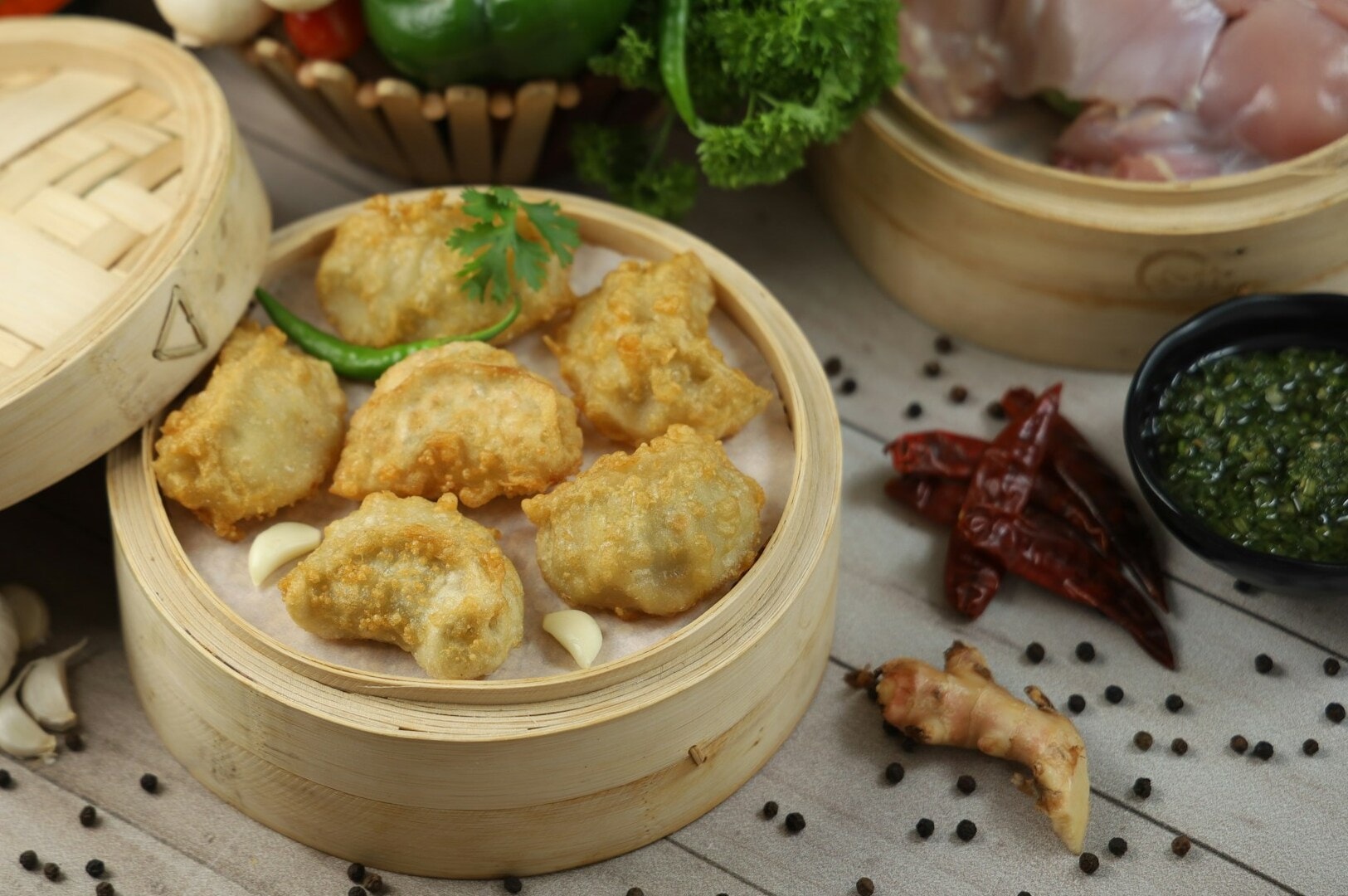 Chinese food served in bamboo containers on a wooden table, celebrating the festive spirit of Chinese New Year.