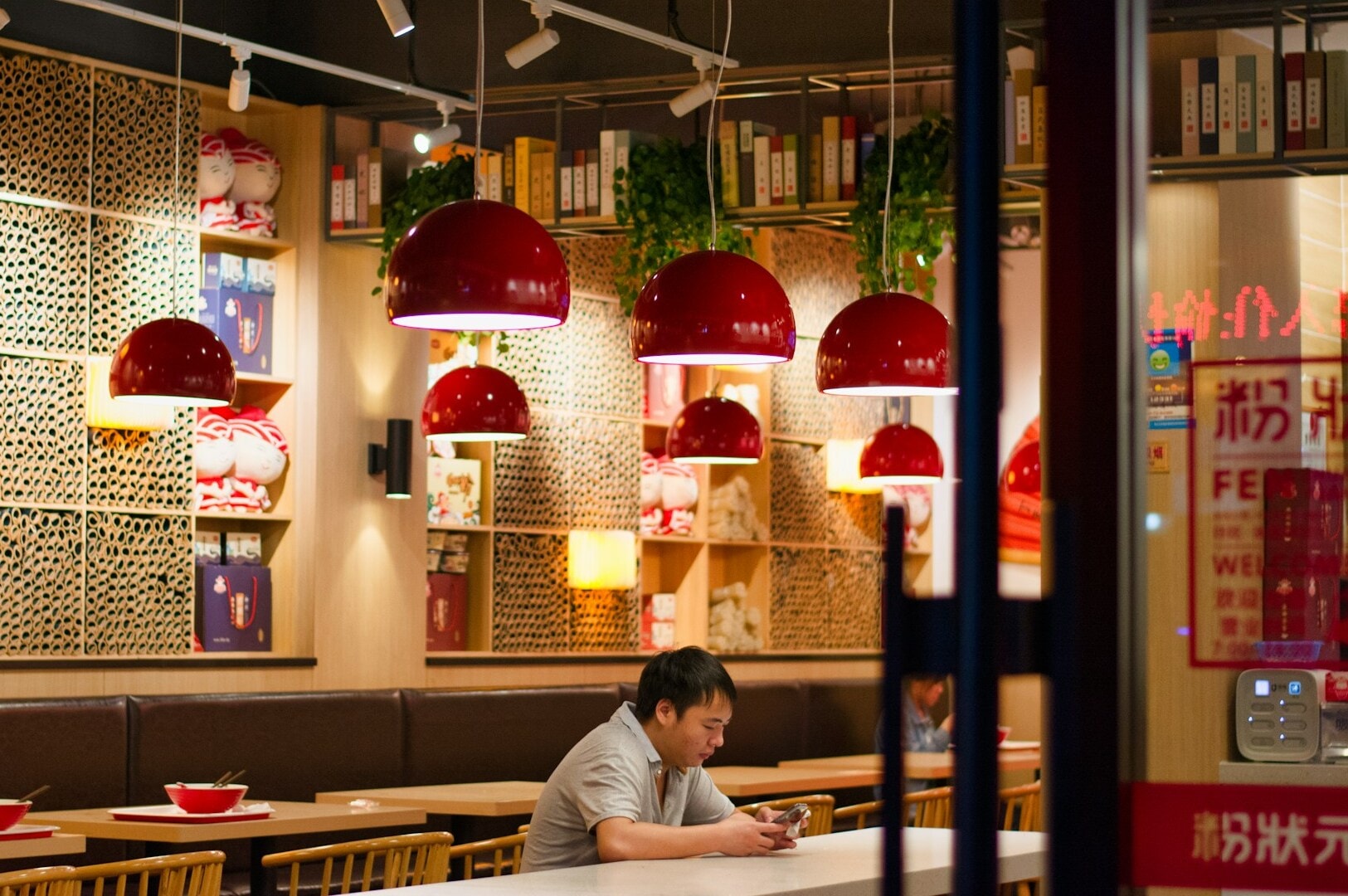 A man dining at a table in a luxurious restaurant, highlighting the city's most exclusive culinary offerings.