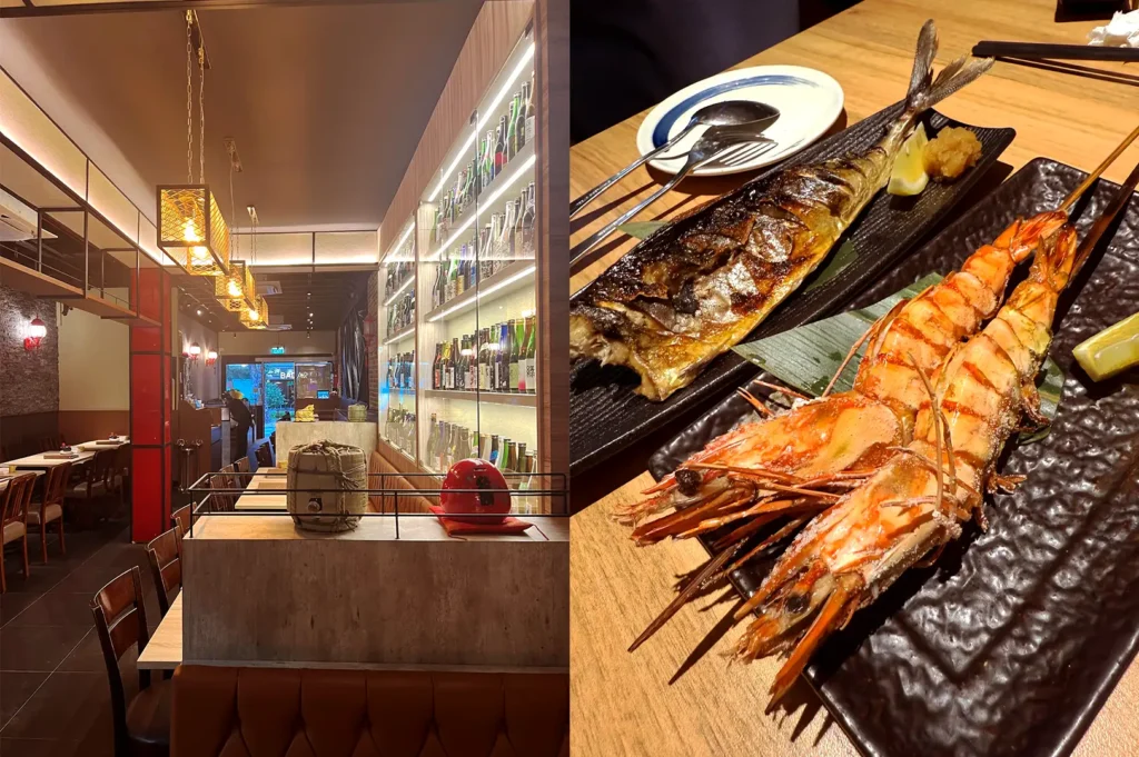 Warm, inviting interior of Nanami Izakaya on Craig Road, Tanjong Pagar, showcasing a backlit sake bottle wall alongside a platter of fresh, charcoal-grilled mackerel and prawns.