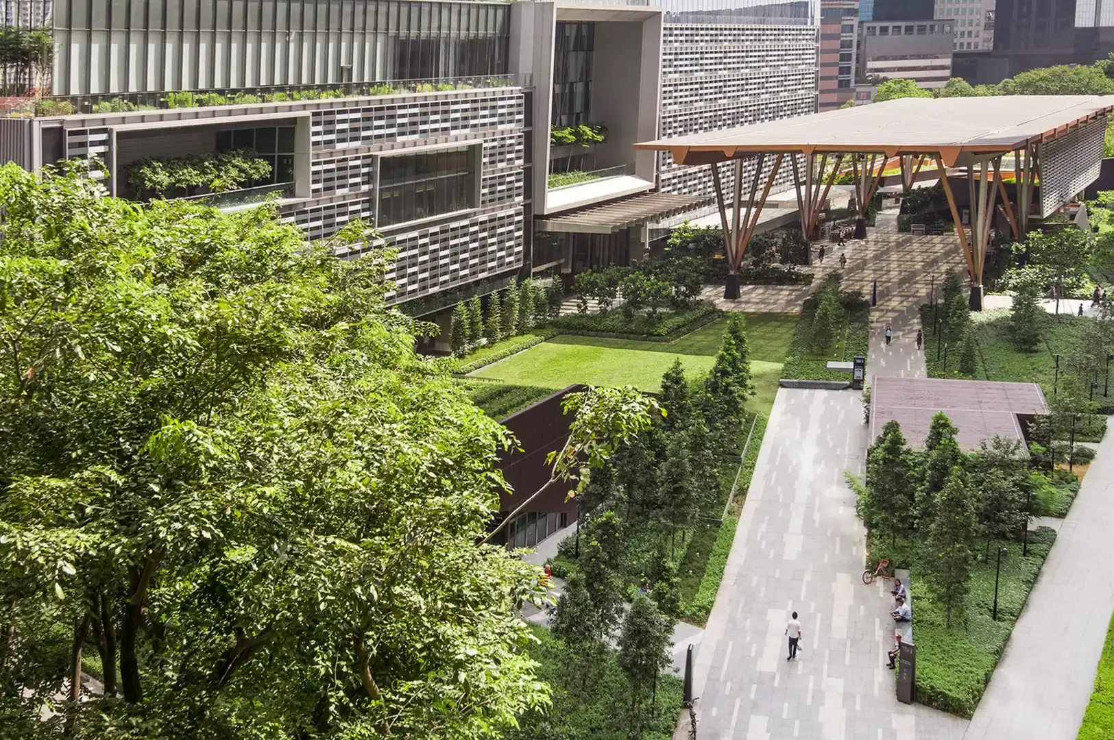 Aerial view of the modern architectural surroundings and lush greenery around Tanjong Pagar Centre where Kuro Maguro Sushi and Dining is located.