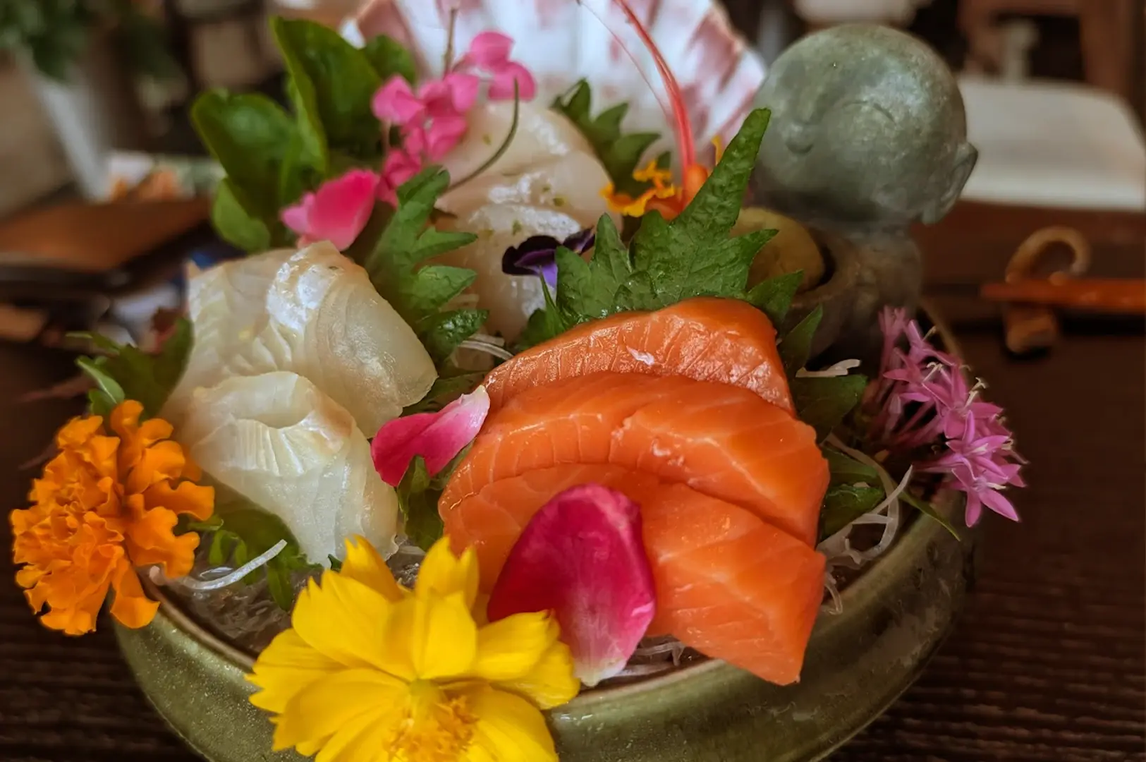 A display of the signature Momiji set, featuring the fresh, premium sashimi platter that is artfully decorated at OUMI.