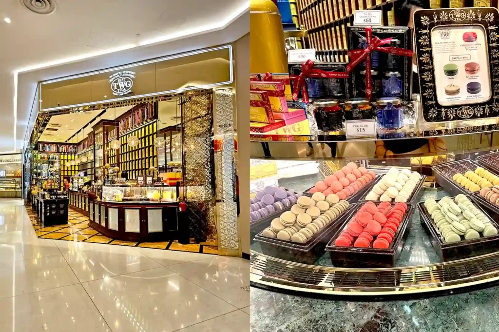 The elegant storefront and display of premium tea products and colorful macarons at TWG Tea in Republic Plaza.