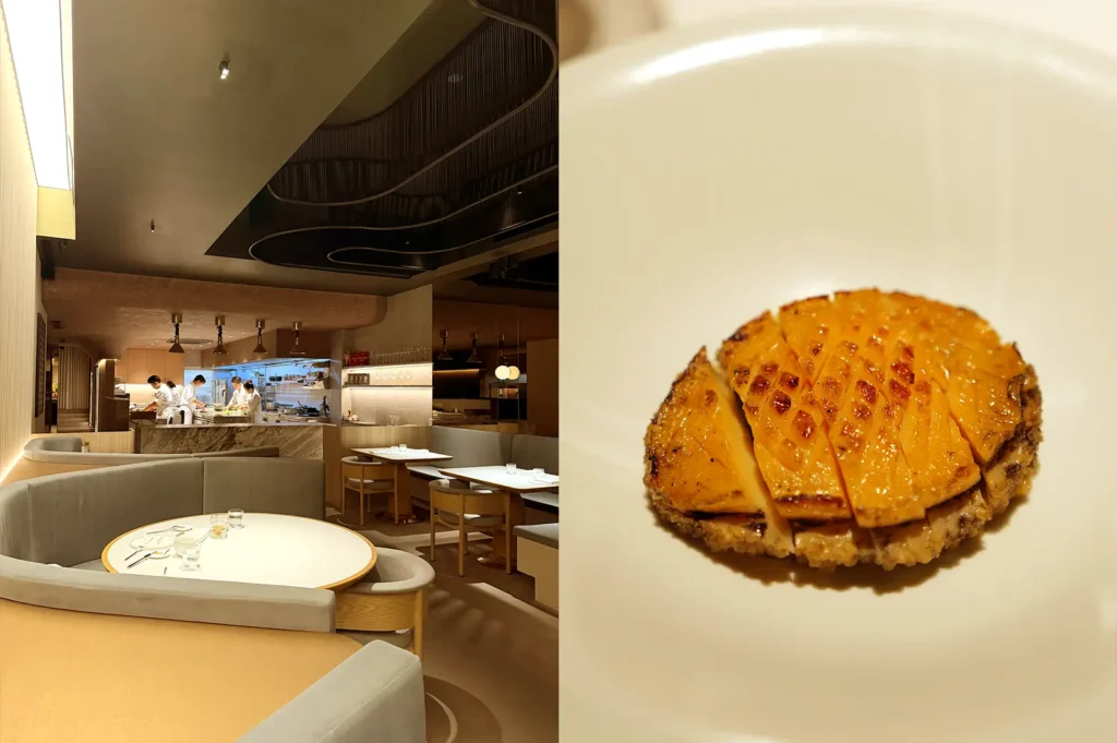 Meta Restaurant's sophisticated dining area with an open kitchen and a close-up of a meticulously scored, seared abalone dish.