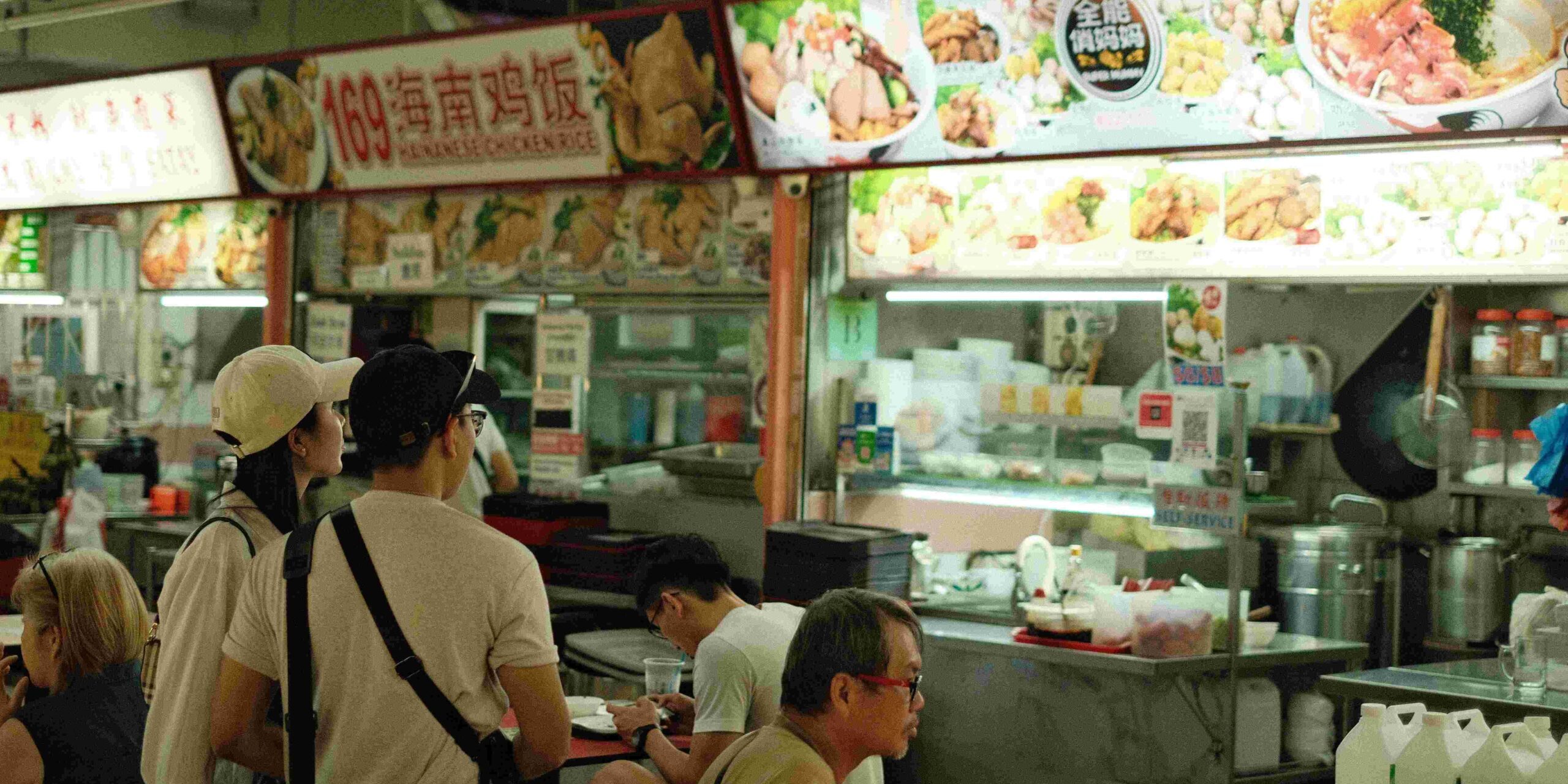 A busy Hawker stall, one of the most common sceneries in modern Singapore.